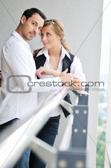 romantic happpy couple on balcony