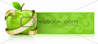 glossy glass green apple with measuring line banner