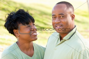 Attractive Happy African American Couple Posing in the Park.