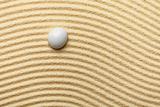 Abstract composition -  sandy wavy background and glass drop