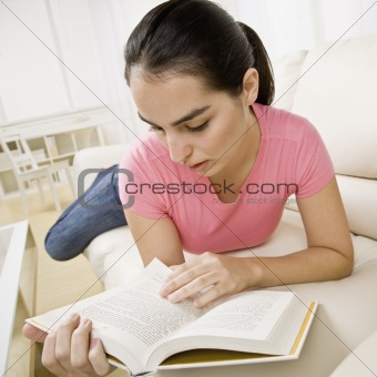 Young Woman Writing in Journal
Young Woman Reading