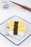 sushi with chopstick and plate