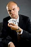 Poker player showing best hand