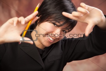 Pretty Multiethnic Girl Poses for Her Portrait Making a Frame with Hands.