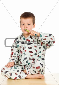 Kid brushing teeth before bedtime