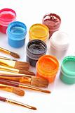 Gouache pots and brushes isolated on white