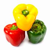 Three sweet peppers in yellow, red and green