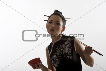 oriental girl with chopstick