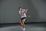 one young woman play tennis