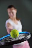 one young woman play tennis