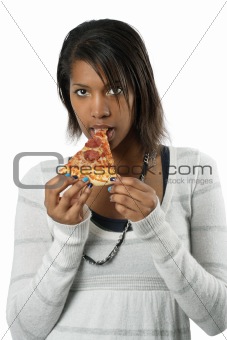 Attractive female eating pizza