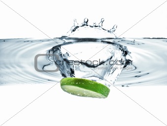 lime slice falling into water 