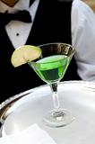 Bright green apple martini