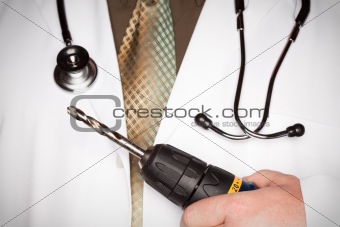 Doctor with Stethoscope Holding A Very Big Drill.