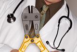 Doctor with Stethoscope Holding A Pair of Cable Cutters.