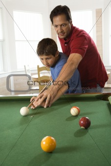 Father and Son Playing Pool
