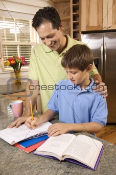 Father Helping Son with Homework