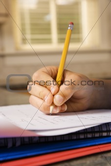 Child Writing in Notebook