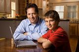 Man and Young Boy with Laptop
