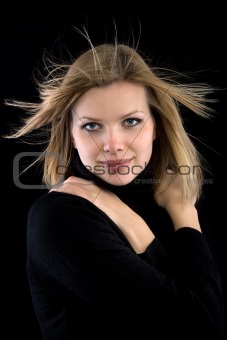 blonde girl in a black turtleneck