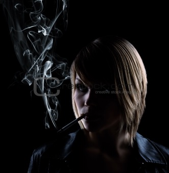 smoking woman on black background