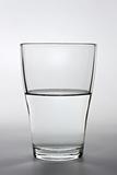 close up shot of an half full water glass