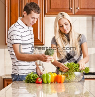 Young Couple Making Salad