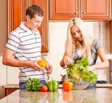 Young Couple Making Salad