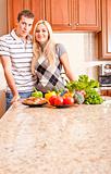 Young Couple Posing in Kitchen