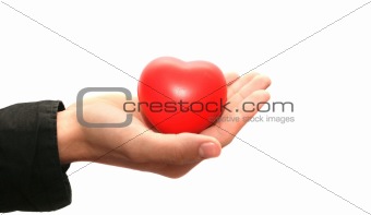 Red heart on the hand