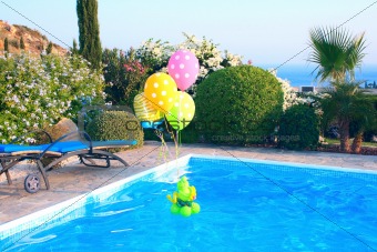 Balloons on swimming pool