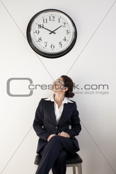 Office Worker Looking at Clock