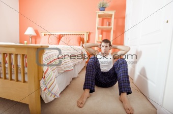 Man Doing Sit-Ups in Bedroom
