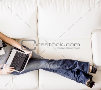 Overhead View of Woman on Couch With Laptop