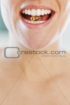 woman eating pill