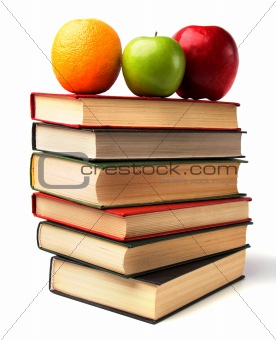book stack with fruits isolated on white background 