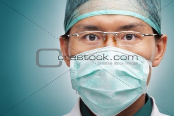 Male medical worker looking seriously