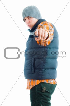 Young man is aiming with gun