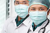 Two Asian surgeon posing to camera