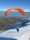 Paraglider snow take off