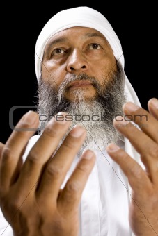 Middle Eastern Man Praying
