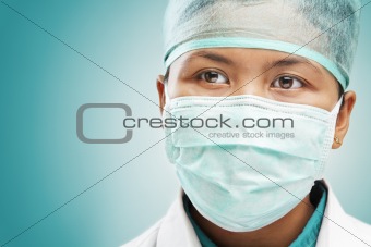 Female medical worker looking away