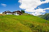 Alpine chalet in mountains. Summer time