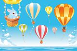 Hot air balloons in the sky on the sea with bunny