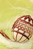 Easter egg with brown crochet decoration