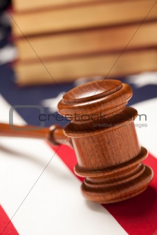 Gavel and Books on the American Flag with Selective Focus.