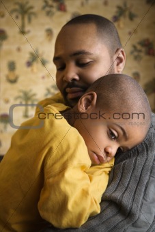 Loving Father Holding Young Son
