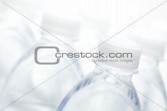 Water Bottles Abstract Image on a Gradated White Background.