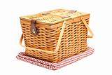 Picnic Basket and Folded Blanket Isolated on a White Background.
