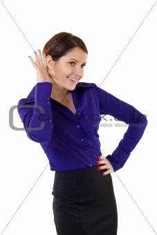 Young business woman cupping hand behind ear